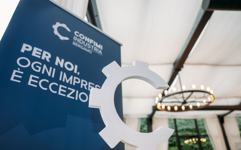 Agenzia di Comunicazione Publifarm | Pure Creative Agency I 60 anni di Confimi Industria Bergamo: il logo, l’evento e la campagna affissioni  1